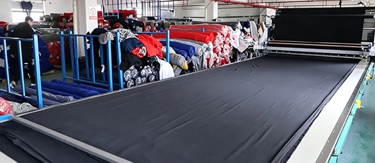 Multi-line assembly sewing workshop of car rooftop storage bag factory, multiple workstations for mass OEM production of waterproof roof packs